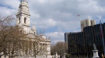 A photo of the Guildhall building with Guildhall Square.