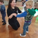 staff and child at Let's Play Portsmouth event