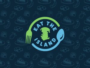 graphic of east the island, with a navy background. there is a green fork and a blue spoon curling around the wording, with an outline of Portsmouth in green in the centre