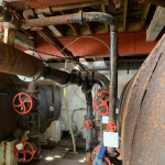 Plant room. Pipes and tanks.