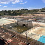 Pool. almost empty of water.