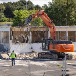 Spectator stand being demolished