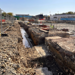 Dug out trench around edge of pool