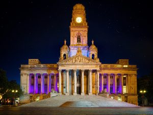 Portsmouth's Guildhall lit up purple at night