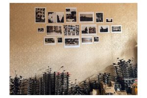 Image of photographs attached to a wall