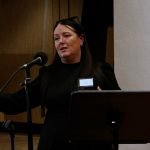 A lady speaker at social value event
