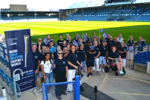 Some of the 105 baton bearers at an event at Fratton Park to launch the route