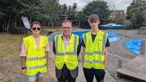 Cllr Darren Sanders and playground users Roxy and Leon stand in front of Stamshaw adventure playground