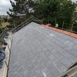 Roof nearing completion being repaired